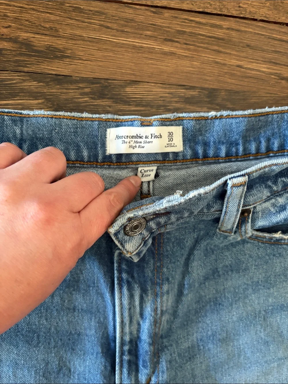 Distressed Light Blue Denim Shorts - Women's